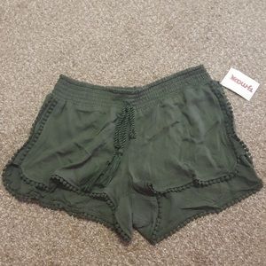 Olive green lounge/beach shorts.